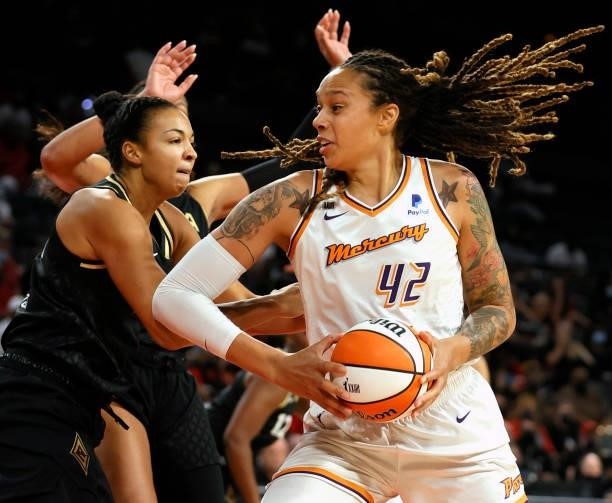 Brittney Griner of the Phoenix Mercury drives against Kiah Stokes of the Las Vegas Aces during Game Two of the 2021 WNBA Playoffs semifinals at...