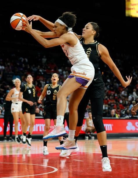 Liz Cambage of the Las Vegas Aces knocks the ball away from Kia Vaughn of the Phoenix Mercury during Game Two of the 2021 WNBA Playoffs semifinals at...