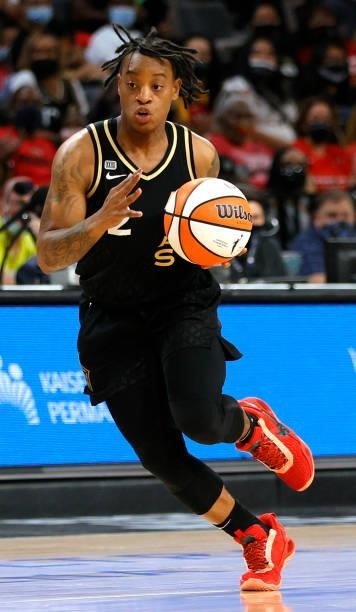 Riquna Williams of the Las Vegas Aces brings the ball up the court against the Phoenix Mercury during Game Two of the 2021 WNBA Playoffs semifinals...