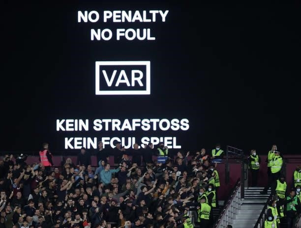 Var decision is shown on the big screen during the UEFA Europa League group H match between West Ham United and Rapid Wien at Olympic Stadium on...