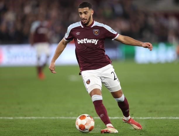 Said Benrahma of West Ham United breaks away from Dejan Petrovic of Rapid Vienna during the UEFA Europa League group H match between West Ham United...