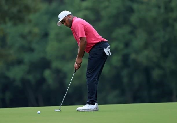 Harold Varner III putts for birdie on the fourth green during round two of the Sanderson Farms Championship at Country Club of Jackson on October 01,...