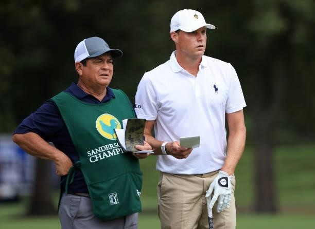 Nick Watney and caddie Tony Navarro prepare to play a shot during round two of the Sanderson Farms Championship at Country Club of Jackson on October...