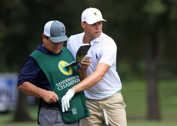 Nick Watney and caddie Tony Navarro prepare to play a shot during round two of the Sanderson Farms Championship at Country Club of Jackson on October...