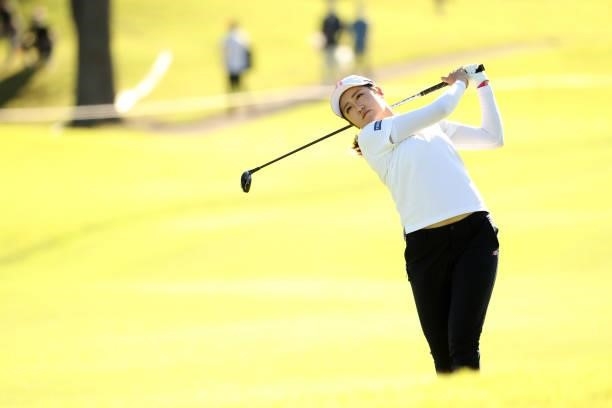 Mone Inami of Japan hits her second shot on the 10th hole during the second round of the 54th Japan Women's Open Golf Championship at Karasuyamajo...