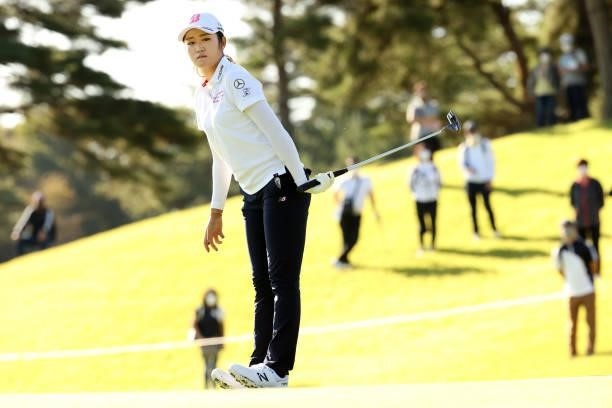 Mone Inami of Japan reacts after a putt on the 10th green during the second round of the 54th Japan Women's Open Golf Championship at Karasuyamajo...