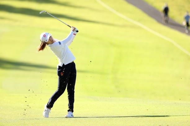 Mone Inami of Japan hits her second shot on the 12th hole during the second round of the 54th Japan Women's Open Golf Championship at Karasuyamajo...