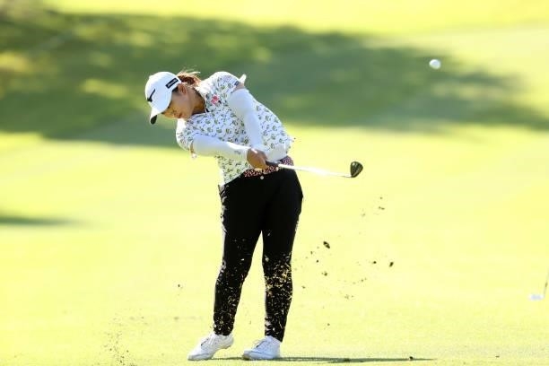 Mao Saigo of Japan hits her second shot on the 12th hole during the second round of the 54th Japan Women's Open Golf Championship at Karasuyamajo...