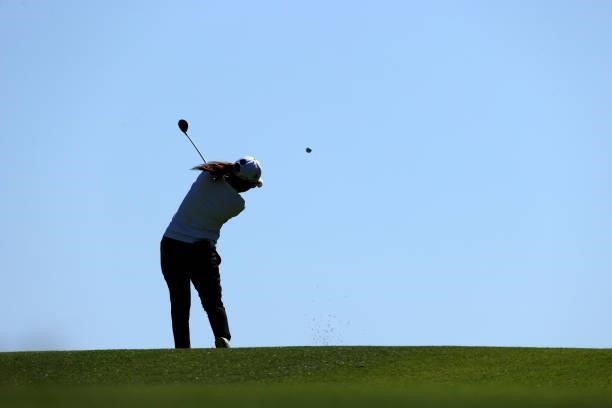 Mika Miyazato of Japan hits her second shot on the 2nd hole during the second round of the 54th Japan Women's Open Golf Championship at Karasuyamajo...
