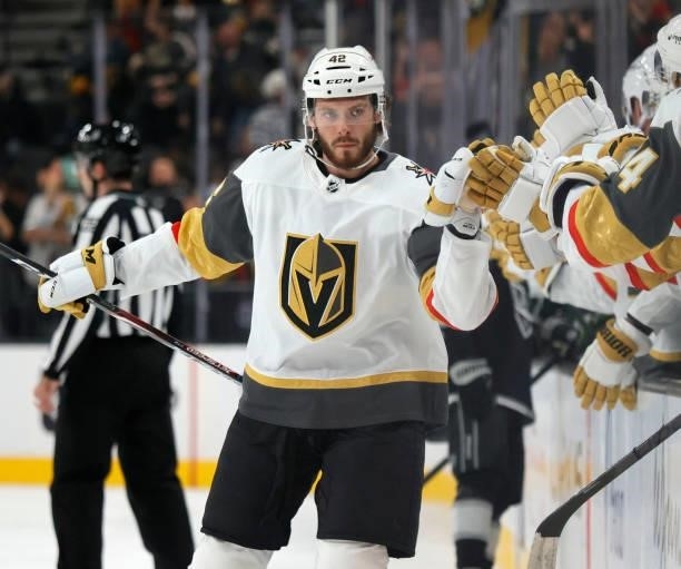 Daniil Miormanov of the Vegas Golden Knights celebrates with teammates on the bench after scoring a first-period goal against the Los Angeles Kings...