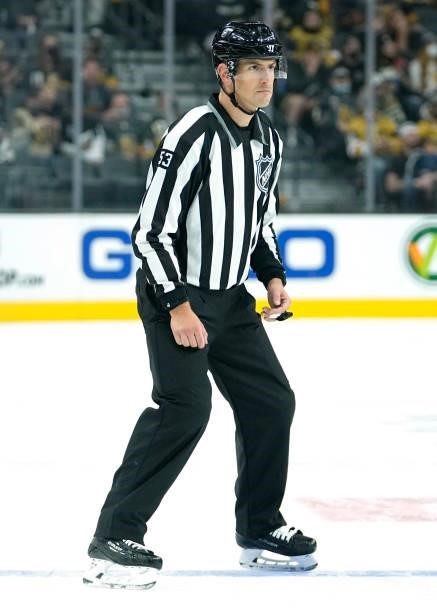 Linesman Bevan Mills is seen during a game between the Vegas Golden Knights and the Los Angeles Kings at T-Mobile Arena on October 01, 2021 in Las...