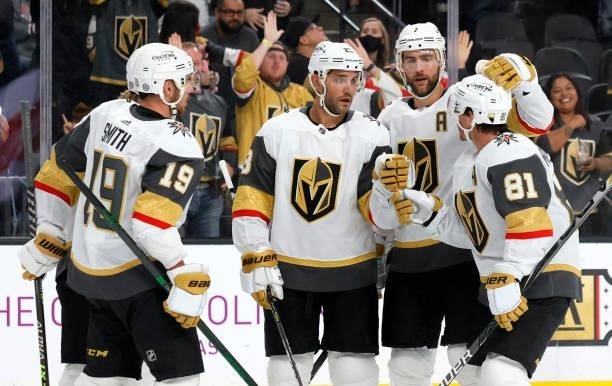 Reilly Smith, Alec Martinez, Alex Pietrangelo and Jonathan Marchessault of the Vegas Golden Knights celebrate after Martinez scored a second-period...