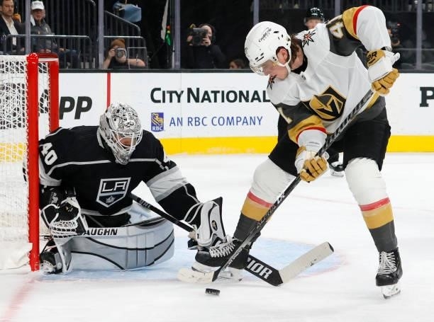 Nolan Patrick Vegas Golden Knights tries to deflect a shot past Calvin Petersen of the Los Angeles Kings during a Vegas power play in the second...