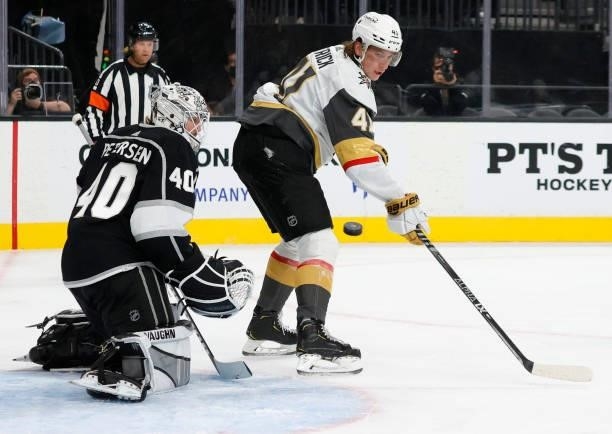 Calvin Petersen of the Los Angeles Kings and Nolan Patrick Vegas Golden Knights watch a Vegas shot sail wide of the net during a Vegas power play in...