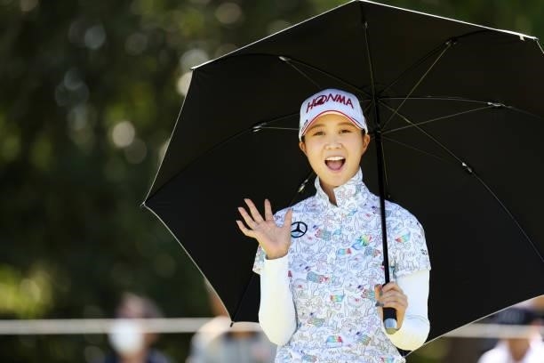 Shina Kanazawa of Japan waves on the 4th tee during the second round of the 54th Japan Women's Open Golf Championship at Karasuyamajo Country Club on...