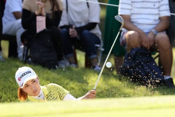 Ritsuko Ryu of Japan hits out from a bunker on the 8th hole during the second round of the 54th Japan Women's Open Golf Championship at Karasuyamajo...