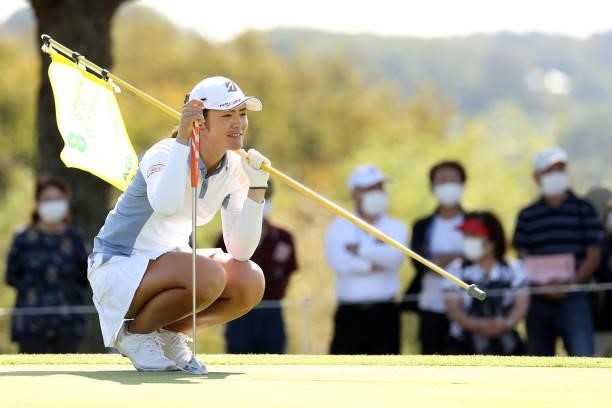 Ayaka Watanabe of Japan lines up a putt on the 8th green during the second round of the 54th Japan Women's Open Golf Championship at Karasuyamajo...