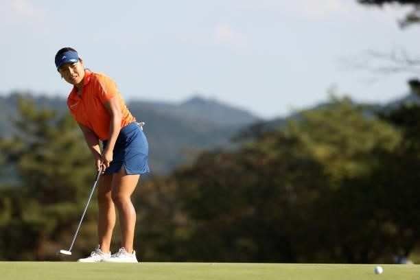 Eri Okayama of Japan attempts a putt on the 8th green during the second round of the 54th Japan Women's Open Golf Championship at Karasuyamajo...