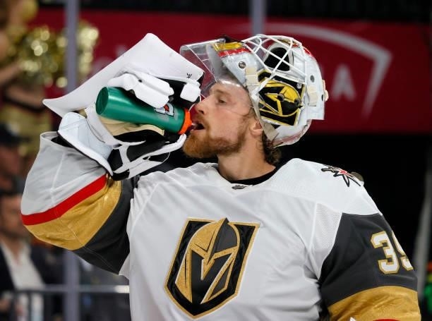 Laurent Brossoit of the Vegas Golden Knights takes a break during a stop in play in the third period of a preseason game against the Los Angeles...