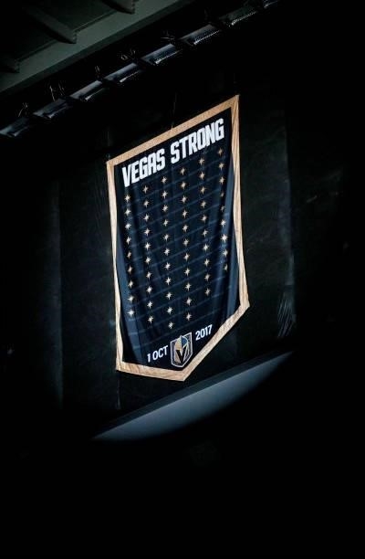 Vegas Strong" banner honoring the 60 victims of the October 1 mass shooting on the Las Vegas Strip is illuminated before a preseason game between the...