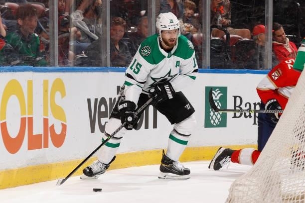 Blake Comeau of the Dallas Stars attempts to pass the puck in front of the Florida Panthers net during a preseason game at the FLA Live Arena on...