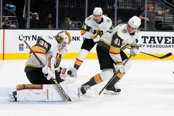 Laurent Brossoit of the Vegas Golden Knights makes a save on a shot by Anze Kopitar of the Los Angeles Kings as Nicolas Hague and Nolan Patrick of...