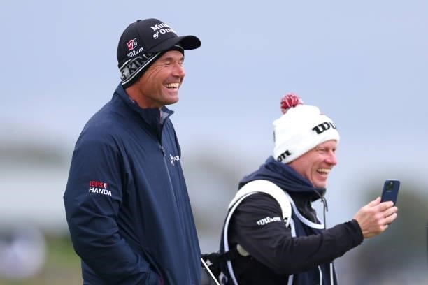 Padraig Harrington of Ireland and his caddie share a joke during Day Three of The Alfred Dunhill Links Championship at The Old Course on October 02,...
