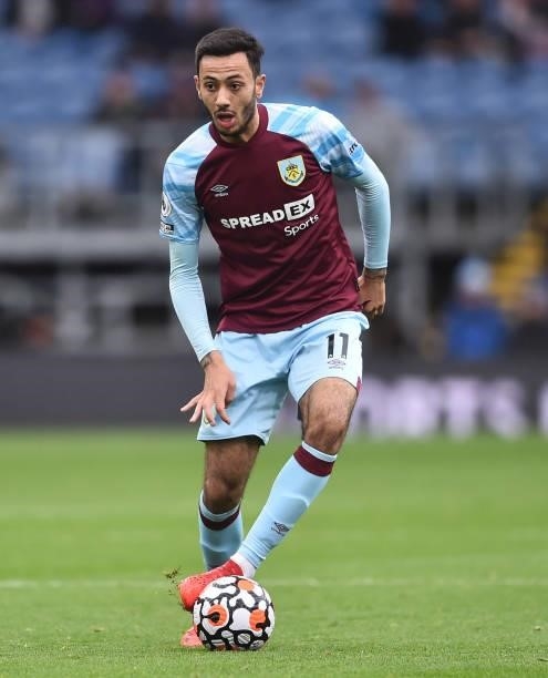 Dwight McNeil of Burnley runs with the ball during the Premier League match between Burnley and Norwich City at Turf Moor on October 02, 2021 in...