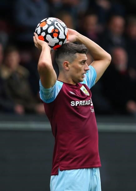 Matthew Lowton of Burnley takes a throw in during the Premier League match between Burnley and Norwich City at Turf Moor on October 02, 2021 in...