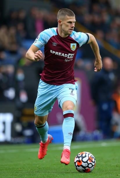 Johann Berg Gudmundsson of Burnley runs with the ball during the Premier League match between Burnley and Norwich City at Turf Moor on October 02,...