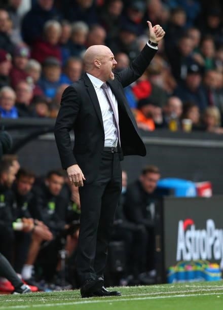 Sean Dyche the manager of Burnley gives a thumbs up during the Premier League match between Burnley and Norwich City at Turf Moor on October 02, 2021...
