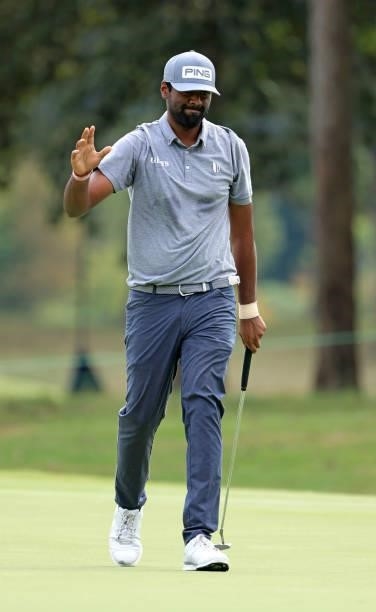 Sahith Theegala reacts to a birdie putt on the sixth hole during round three of the Sanderson Farms Championship at Country Club of Jackson on...