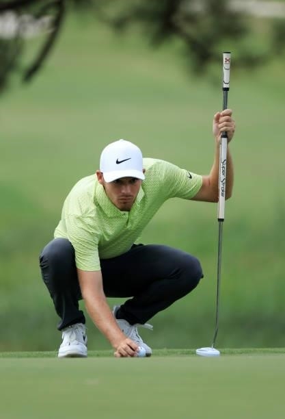Aaron Wise lines up a putt on the first green during round three of the Sanderson Farms Championship at Country Club of Jackson on October 02, 2021...