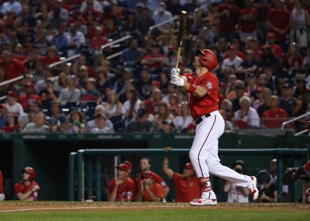 Ryan Zimmerman of the Washington Nationals hits a double against the Boston Red Sox in the eighth inning at Nationals Park on October 02, 2021 in...