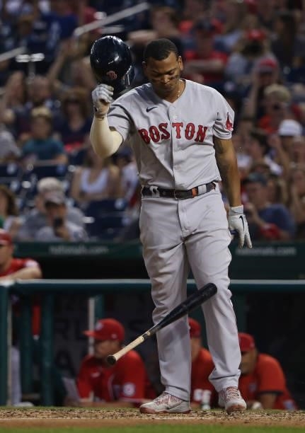 Rafael Devers of the Boston Red Sox reacts after striking out against the Washington Nationals at Nationals Park on October 02, 2021 in Washington,...