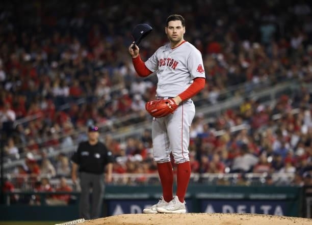 Pitcher Adam Ottavino of the Boston Red Sox prepares to pitch against the Washington Nationals at Nationals Park on October 02, 2021 in Washington,...