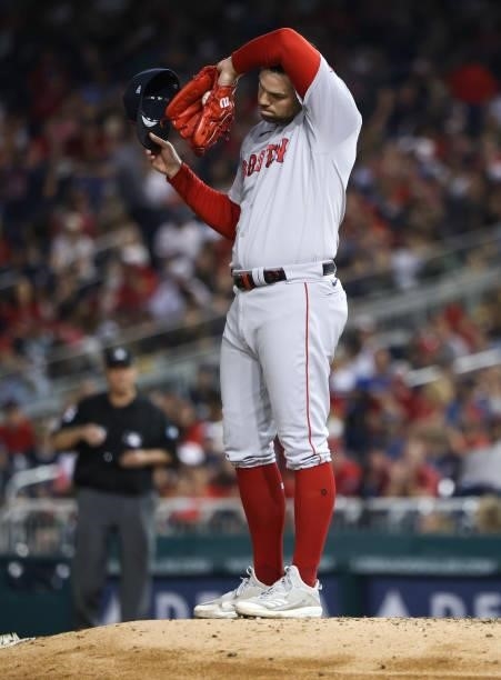 Pitcher Adam Ottavino of the Boston Red Sox prepares to pitch against the Washington Nationals at Nationals Park on October 02, 2021 in Washington,...
