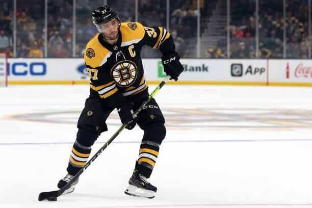 Patrice Bergeron of the Boston Bruins skates against the New York Rangers during the first period of the preseason game at TD Garden on October 02,...