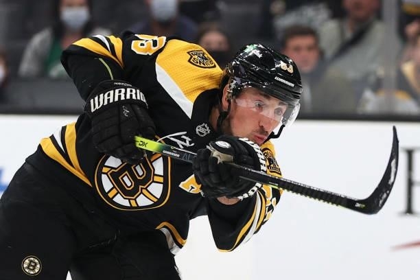 Brad Marchand of the Boston Bruins takes a shot against the New York Rangers during the first period of the preseason game at TD Garden on October...
