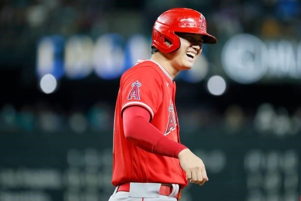 Shohei Ohtani of the Los Angeles Angels stands on first base during the eighth inning against the Seattle Mariners at T-Mobile Park on October 02,...