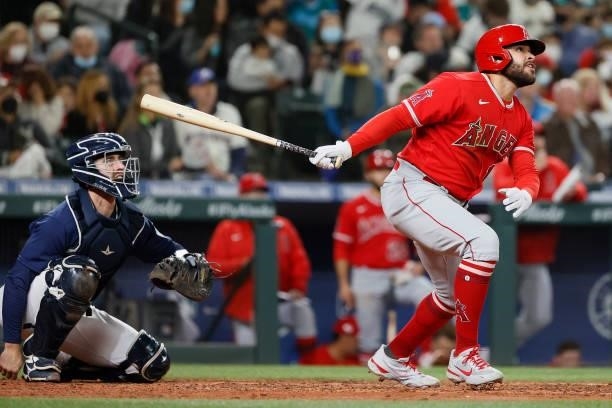 Jose Rojas of the Los Angeles Angels watches his home run during the fifth inning against the Seattle Mariners at T-Mobile Park on October 02, 2021...