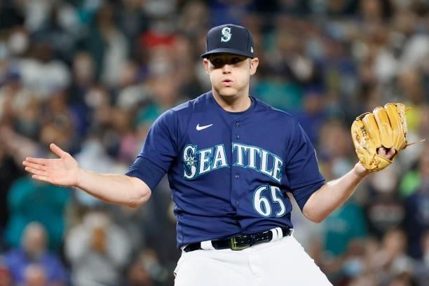 Casey Sadler of the Seattle Mariners reacts during the game against the Los Angeles Angels at T-Mobile Park on October 02, 2021 in Seattle,...