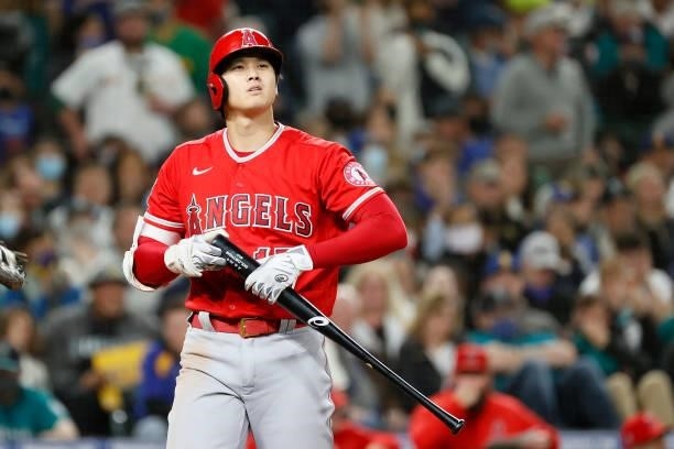 Shohei Ohtani of the Los Angeles Angels looks on during the game against the Seattle Mariners at T-Mobile Park on October 02, 2021 in Seattle,...