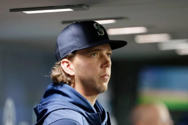 Logan Gilbert of the Seattle Mariners looks on during the game against the Los Angeles Angels at T-Mobile Park on October 02, 2021 in Seattle,...