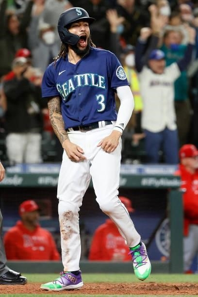 Crawford of the Seattle Mariners reacts after scoring on a single by Mitch Haniger during the eighth inning against the Los Angeles Angels at...