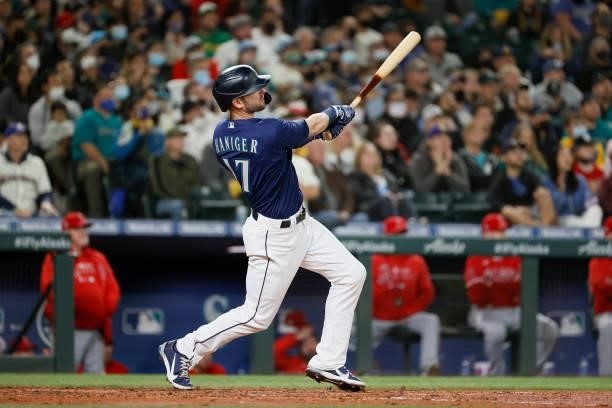 Mitch Haniger of the Seattle Mariners watches his two run home run during the fifth inning against the Los Angeles Angels at T-Mobile Park on October...
