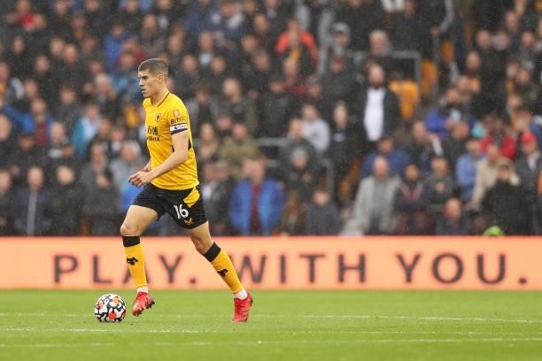 Conor Coady of Wolverhampton Wanderers runs with the ball during the Premier League match between Wolverhampton Wanderers and Newcastle United at...