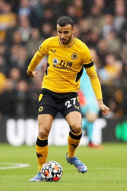 Romain Saiss of Wolverhampton Wanderers runs with the ball during the Premier League match between Wolverhampton Wanderers and Newcastle United at...