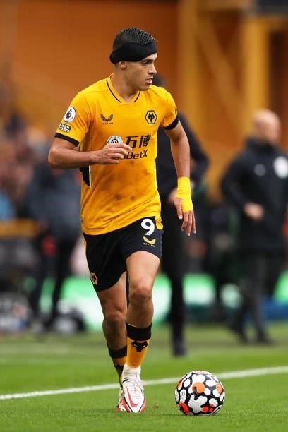 Raul Jimenez of Wolverhampton Wanderers runs with the ball during the Premier League match between Wolverhampton Wanderers and Newcastle United at...