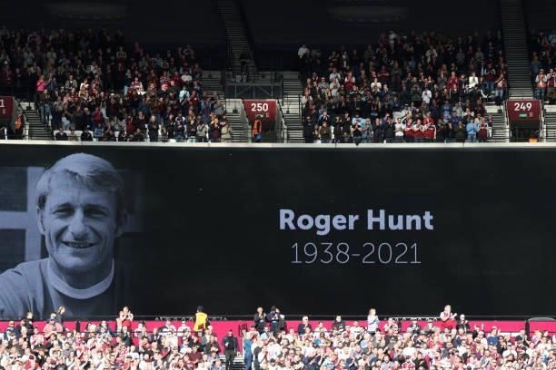 View of a sign in memory of Roger Hunt is shown prior to kick off during the Premier League match between West Ham United and Brentford at London...